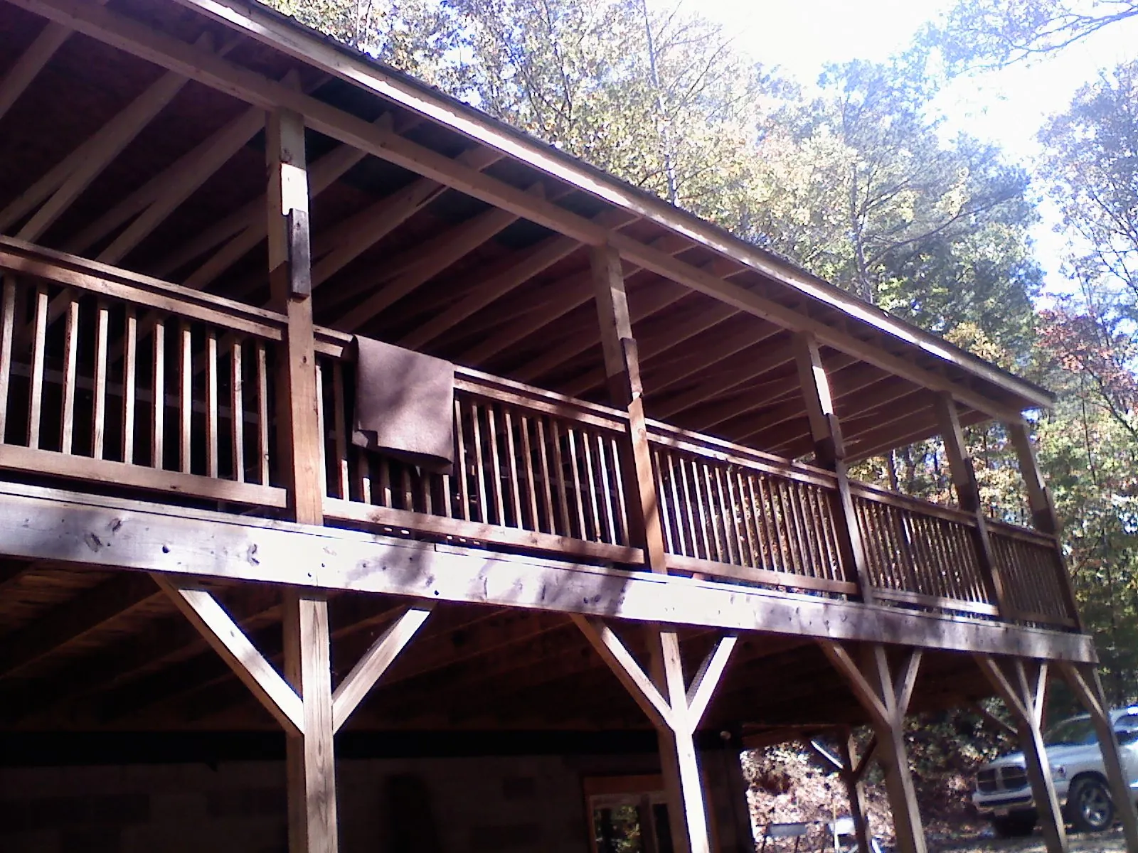 Timber framing under a new elevated porch and deck — Roof Leak Repair in Oakland by Roofing Brothers